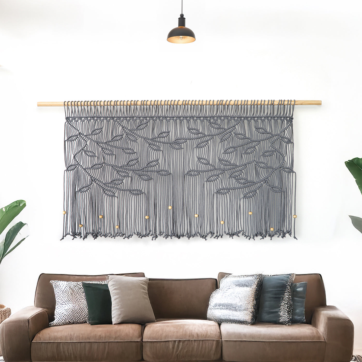 Handmade grey cotton macrame valance for wide windows with decorative leaf knotting.