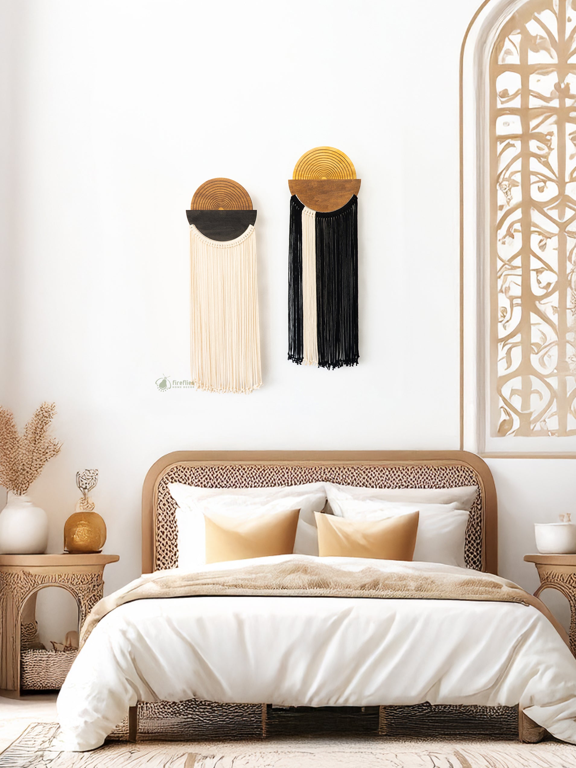 Bedroom with a bed, decorative pillows, and wall art.