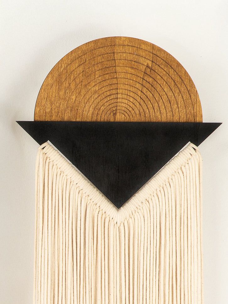 Wooden shelf with a black triangular base on a white background