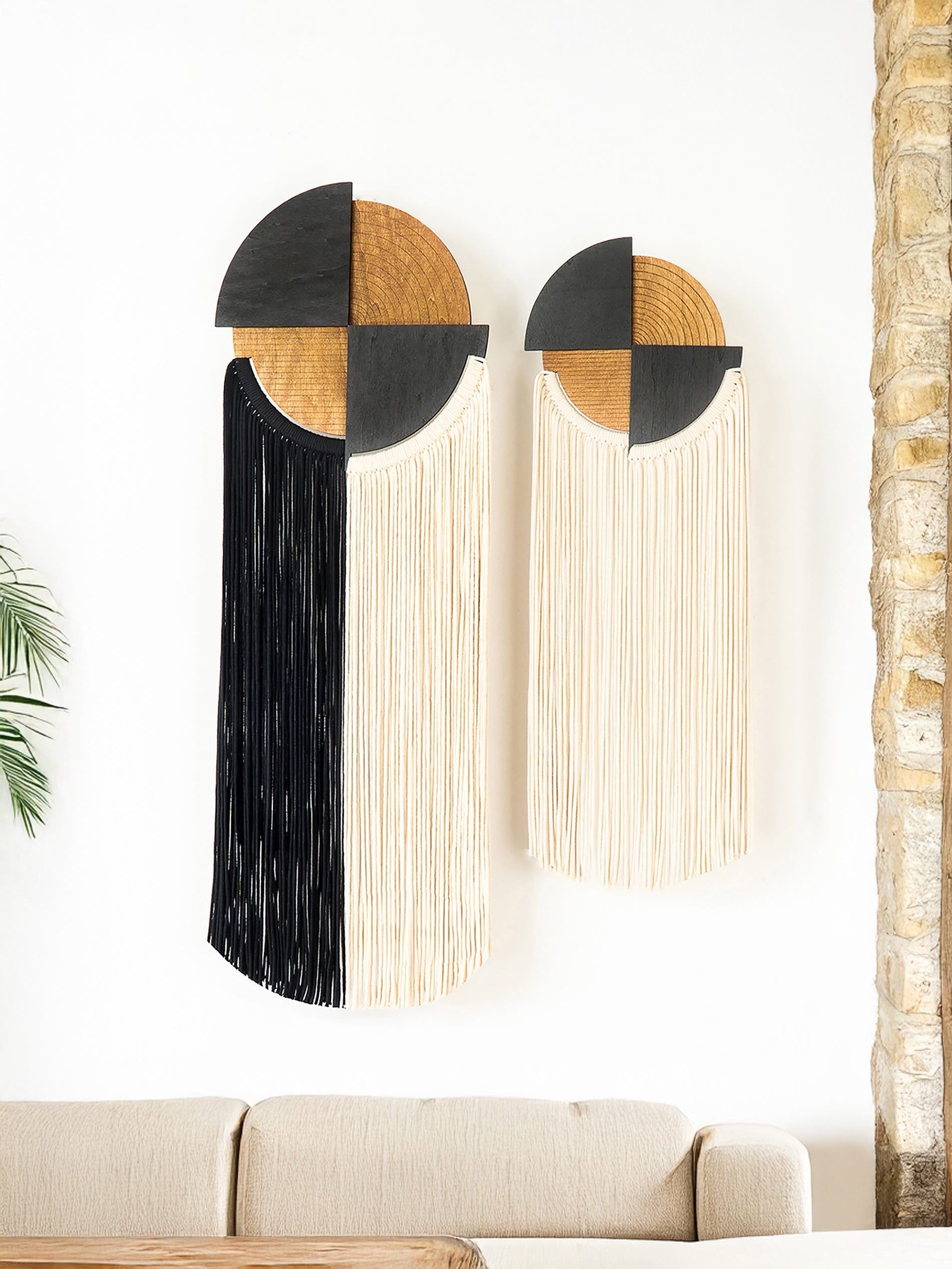 Decorative wall art with geometric design on a white wall.