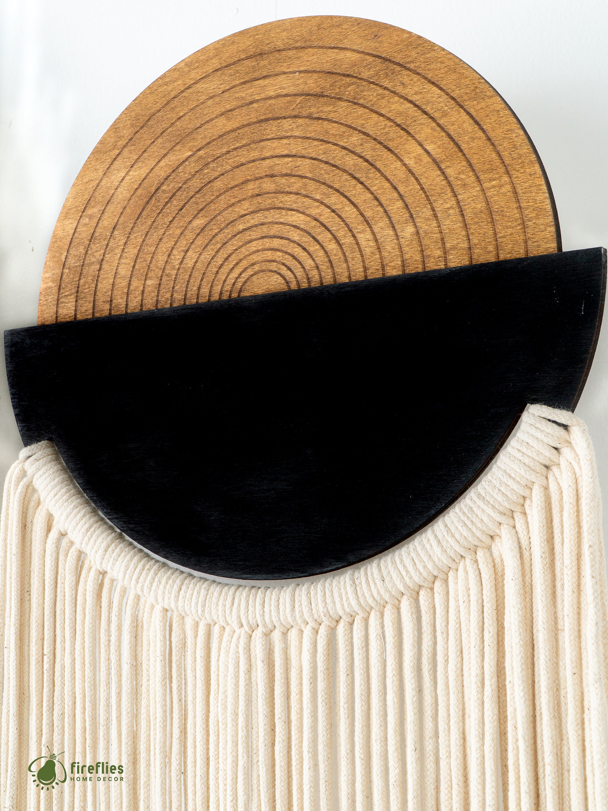 Round woven placemat with black center on a white background