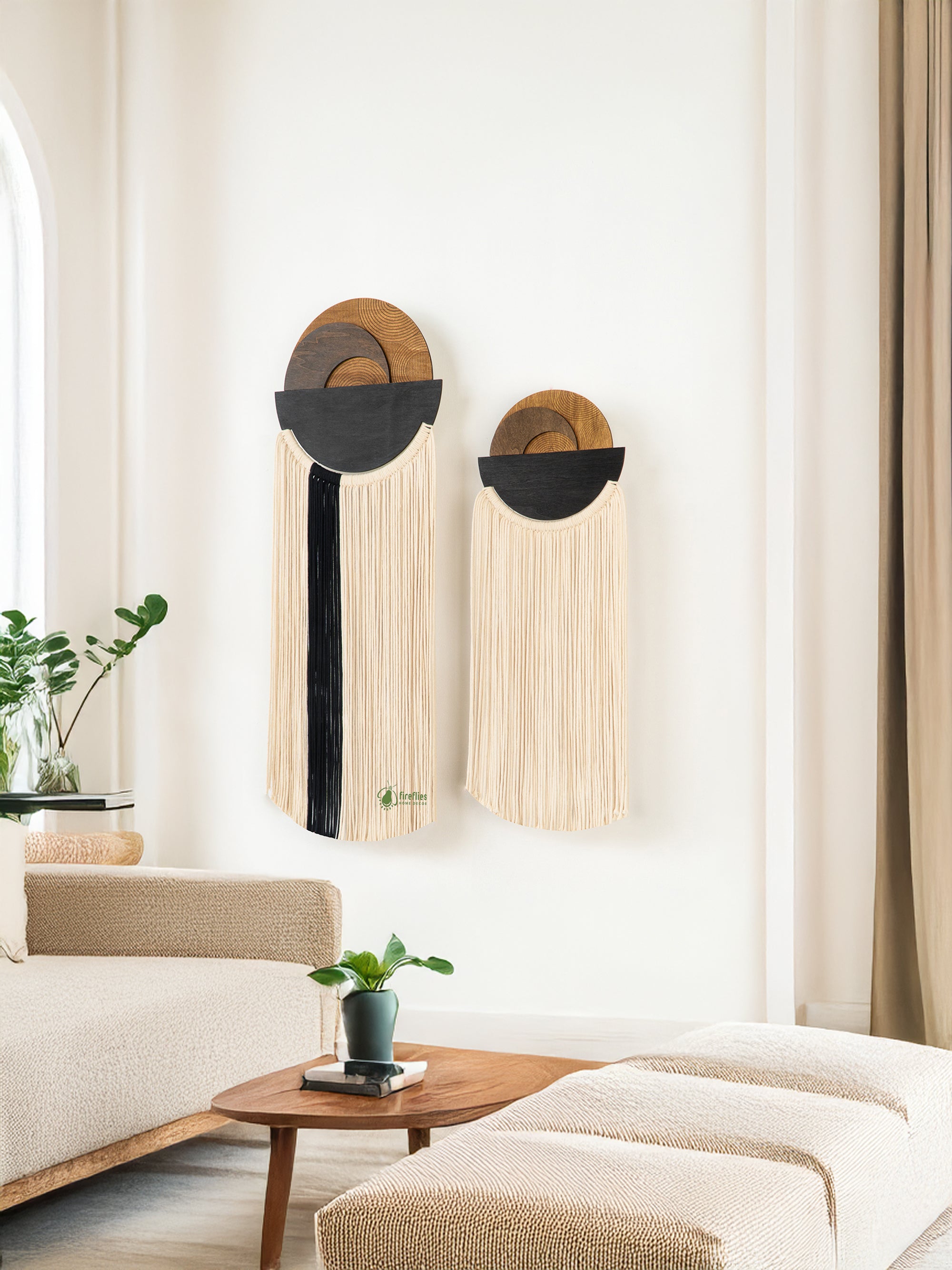 Modern wall art pieces in a living room setting with neutral decor.