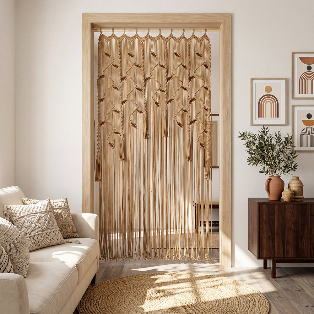 Decorative string curtain in a living room setting with a sofa and side table.