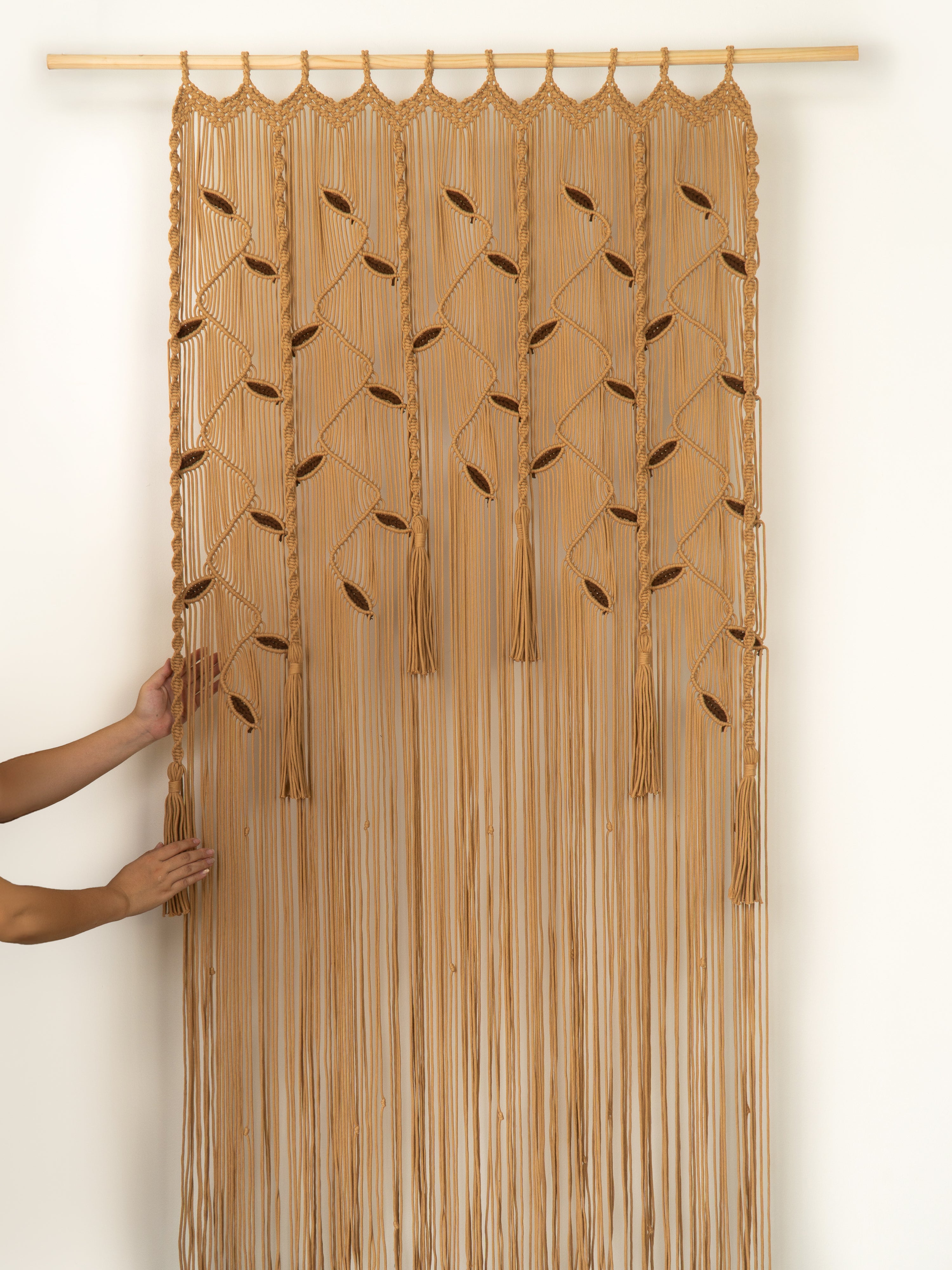 Bamboo curtain with geometric pattern on a white background