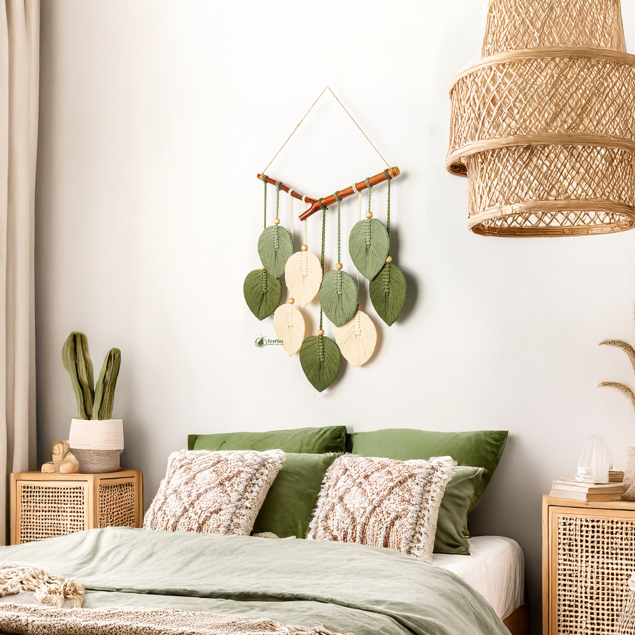 Decorative wall hanging with leaves above a bed in a bedroom setting.