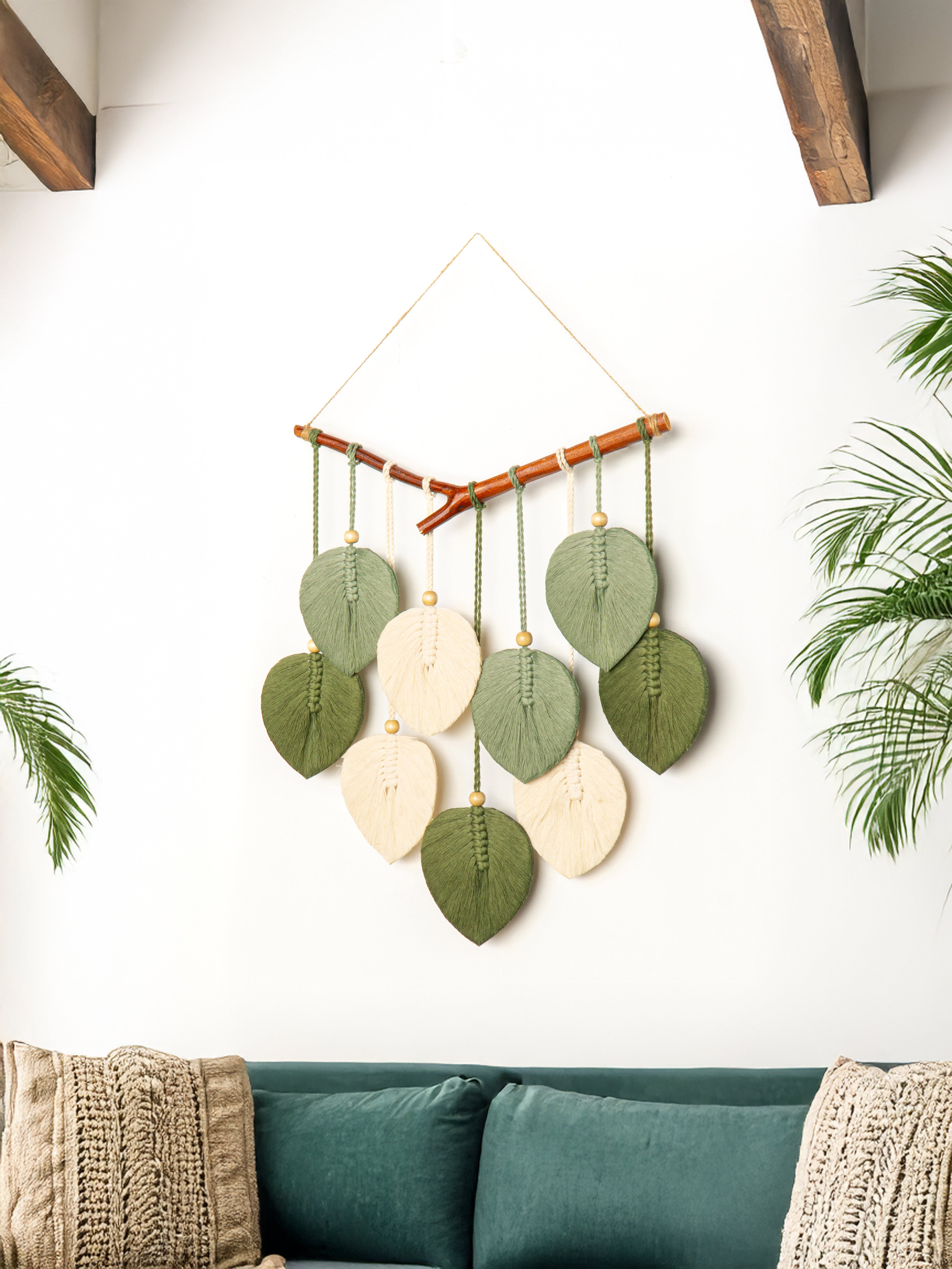 Decorative wall hanging with leaf patterns in a living room setting