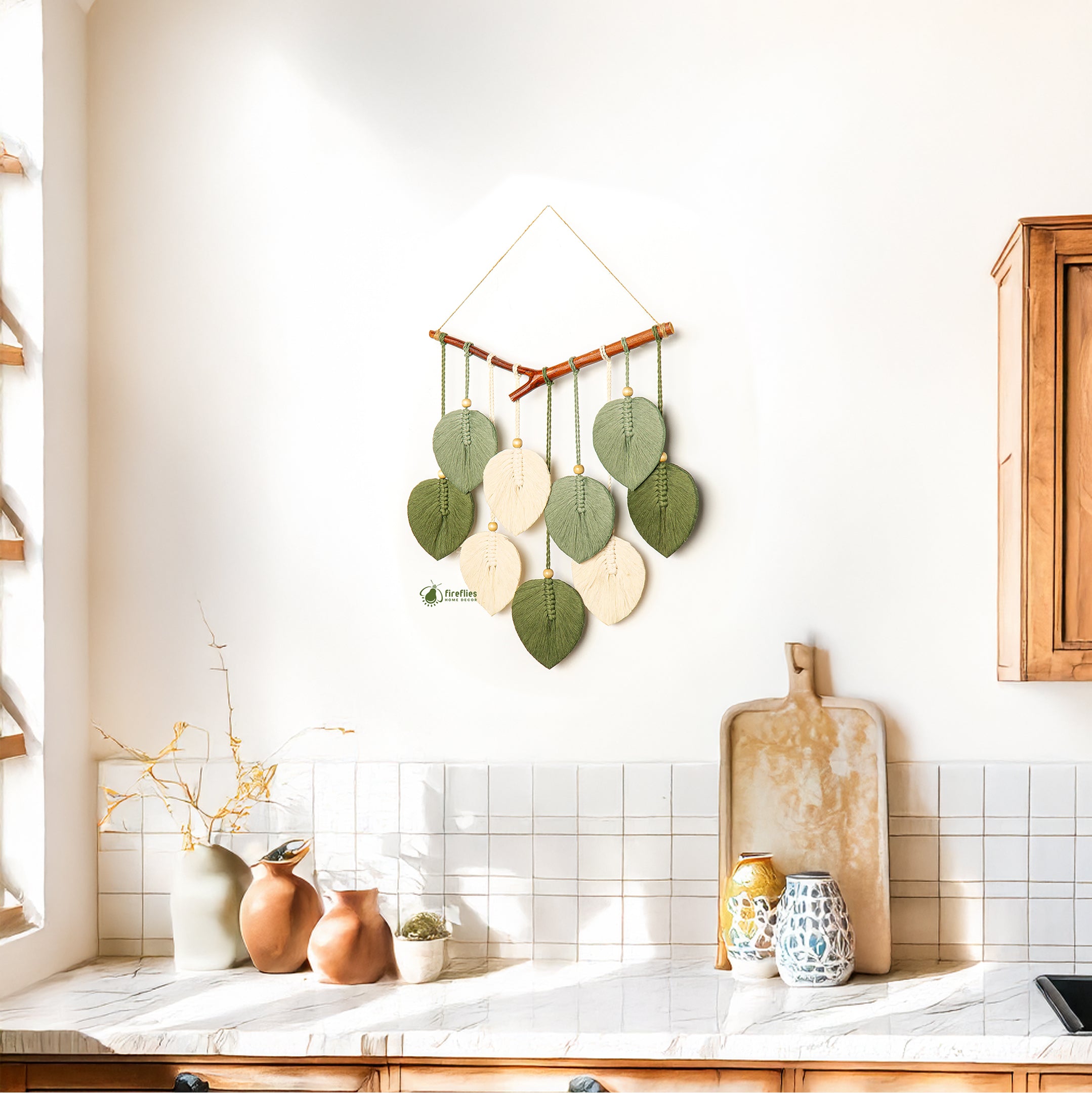 Decorative wall hanging with leaf patterns in a kitchen setting