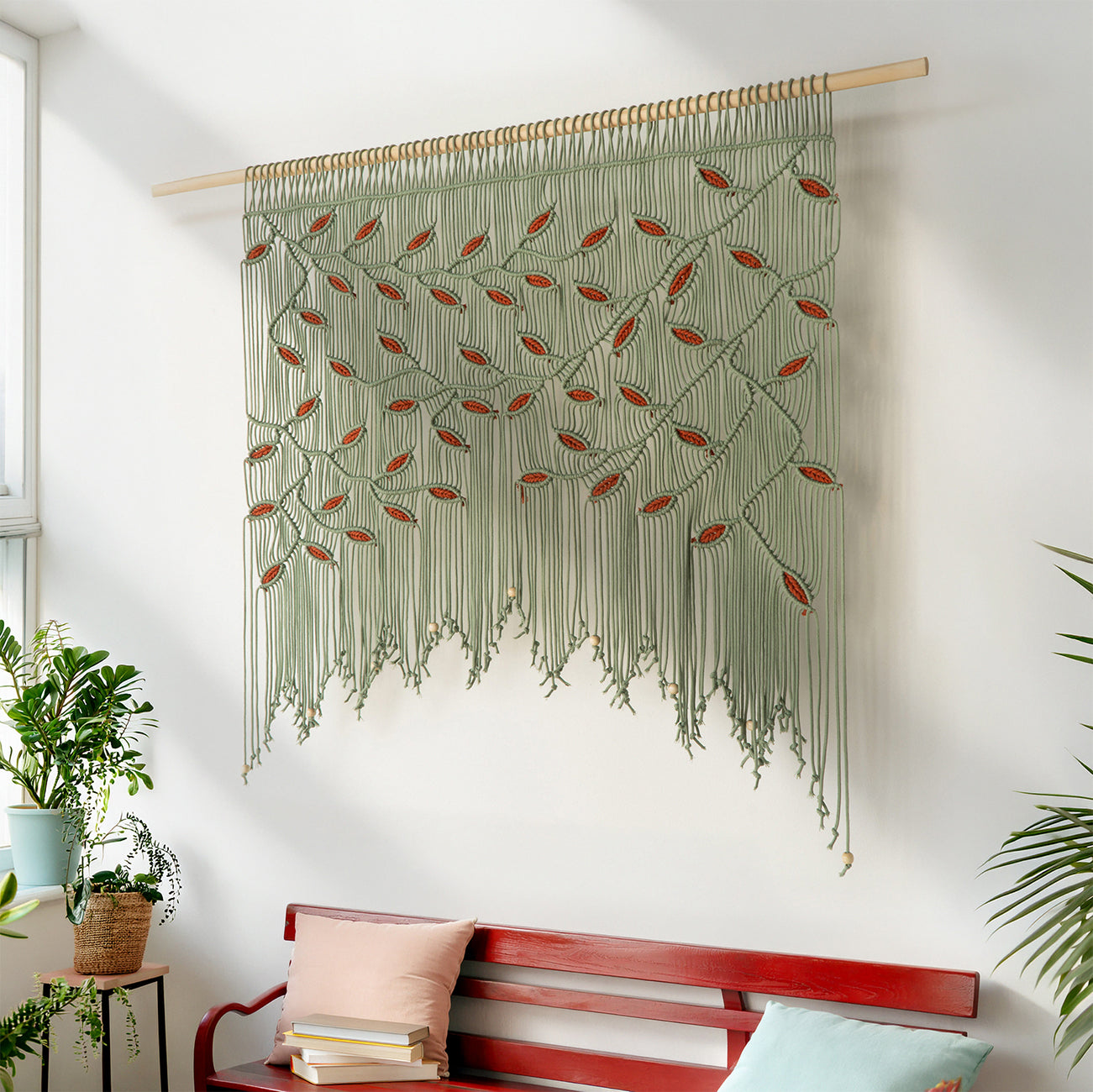 Extra-wide sage green textile wall mural featuring a continuous climbing vine pattern with orange leaf inserts.