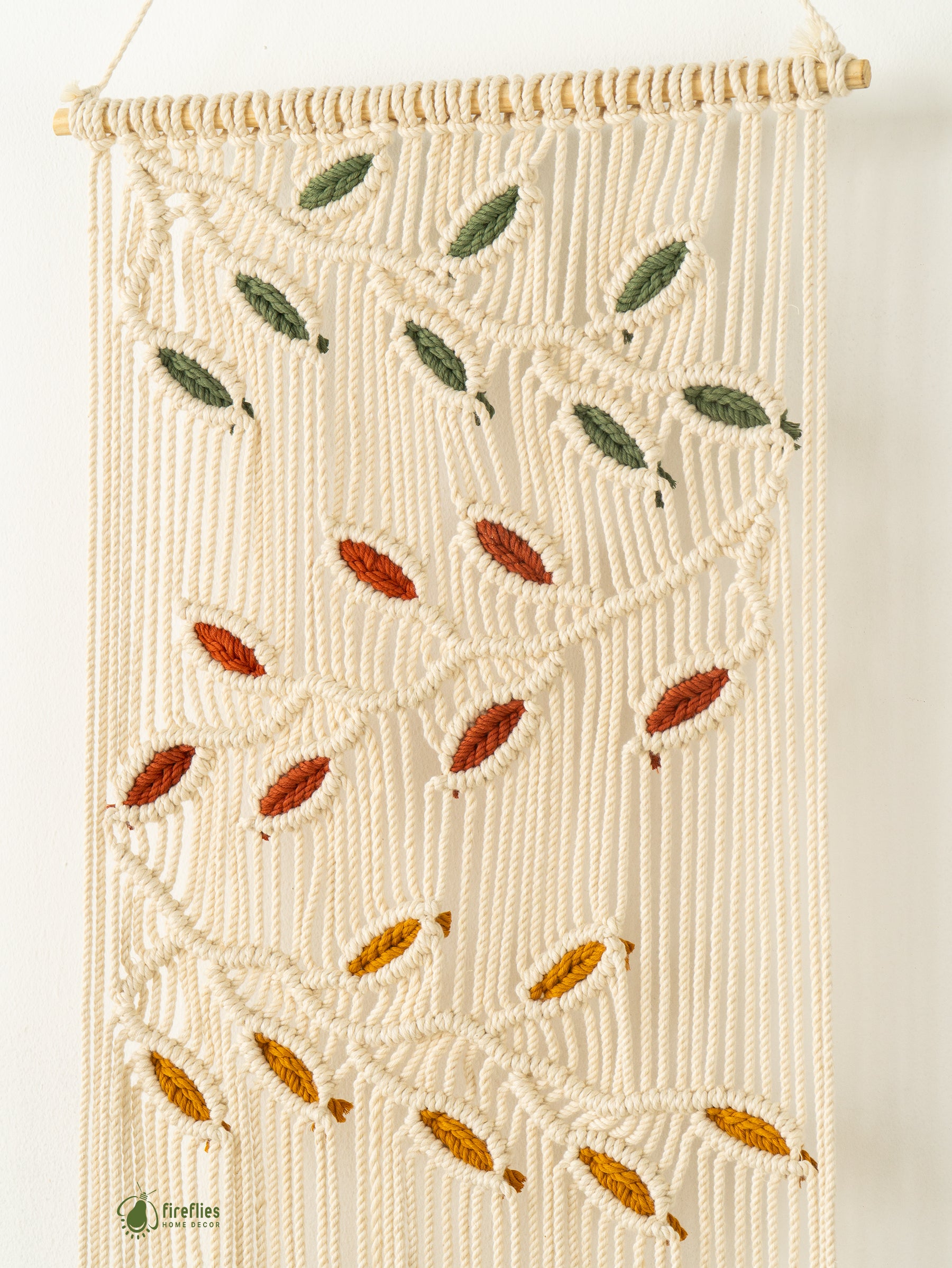 Handwoven macrame curtain, perfect for adding natural charm 
