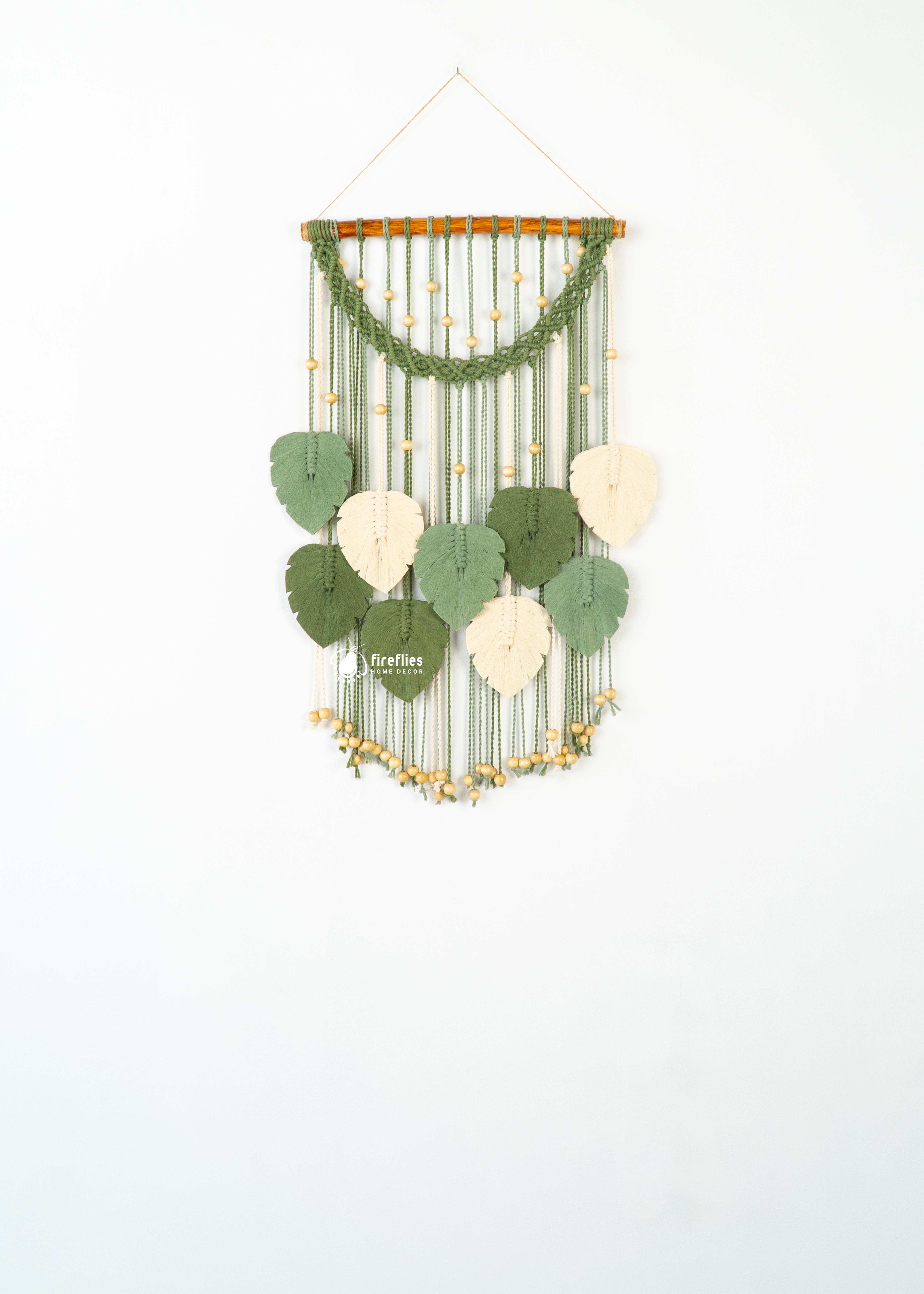 Boho macrame leaf wall art, perfect for adding natural charm    
