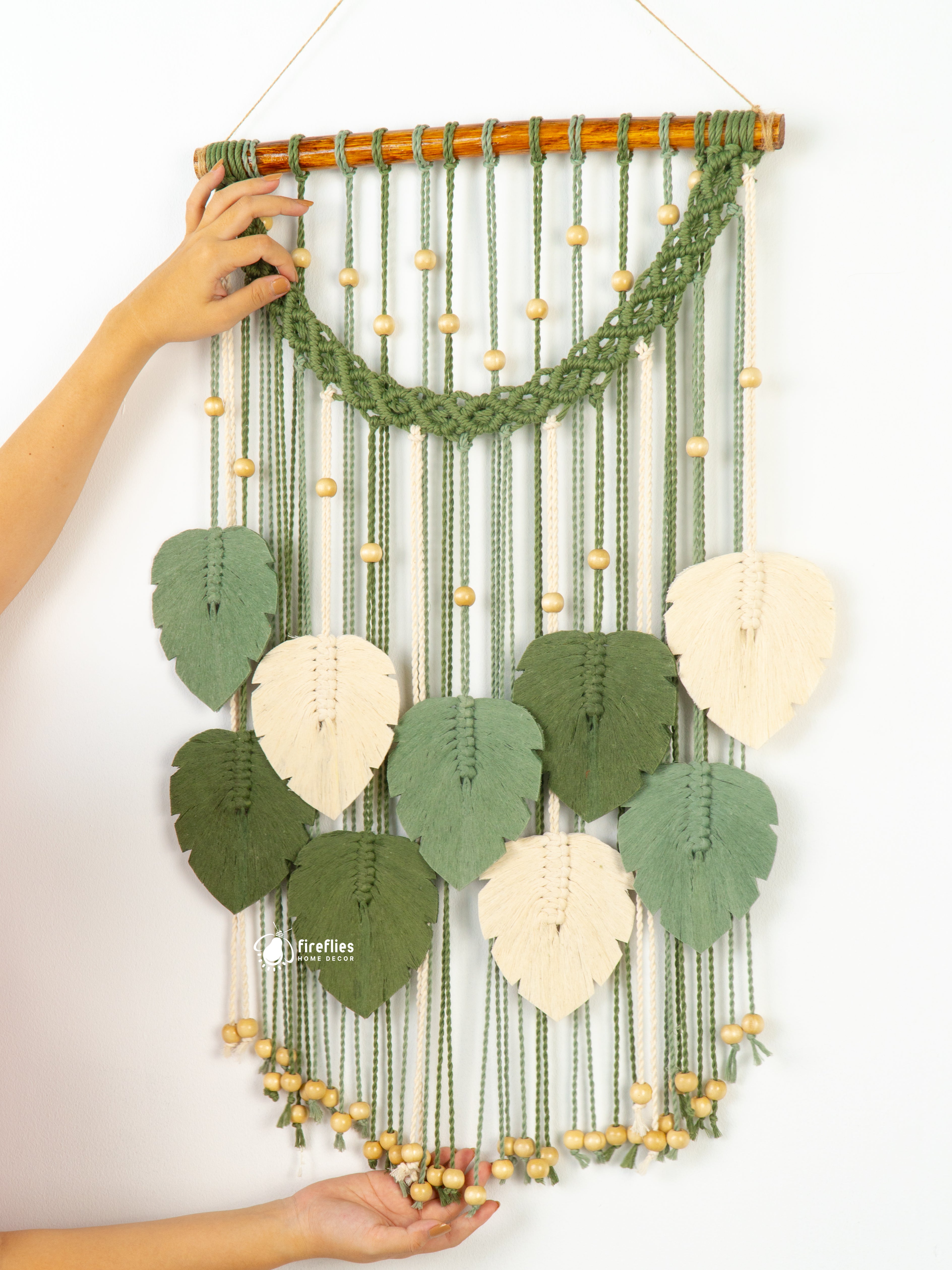 Macrame leaf decor, ideal for minimalist or boho-inspired spaces    
