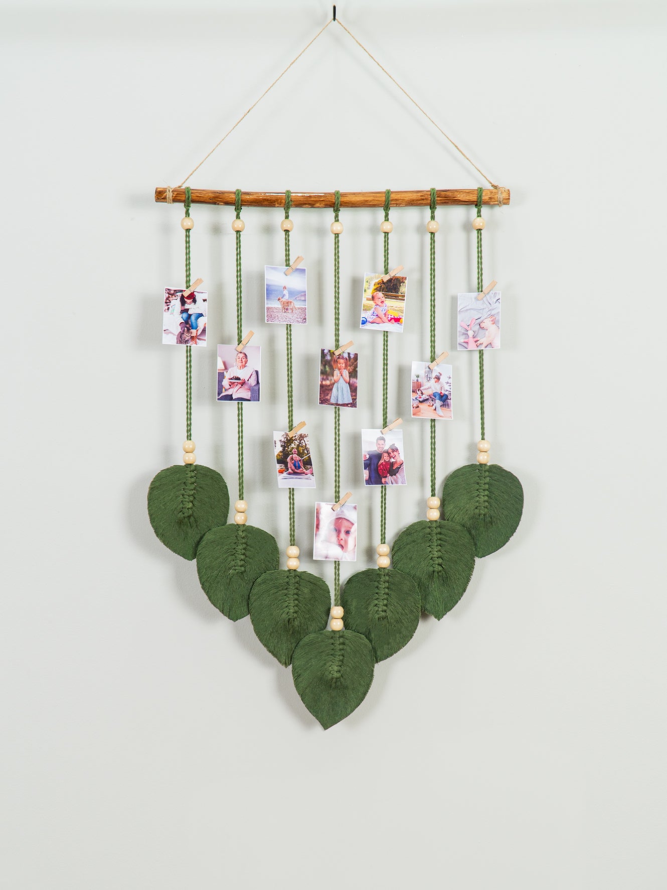 Elegant macrame leaf photo display, ideal for minimalist or contemporary decor, a place to hold valuable memories.