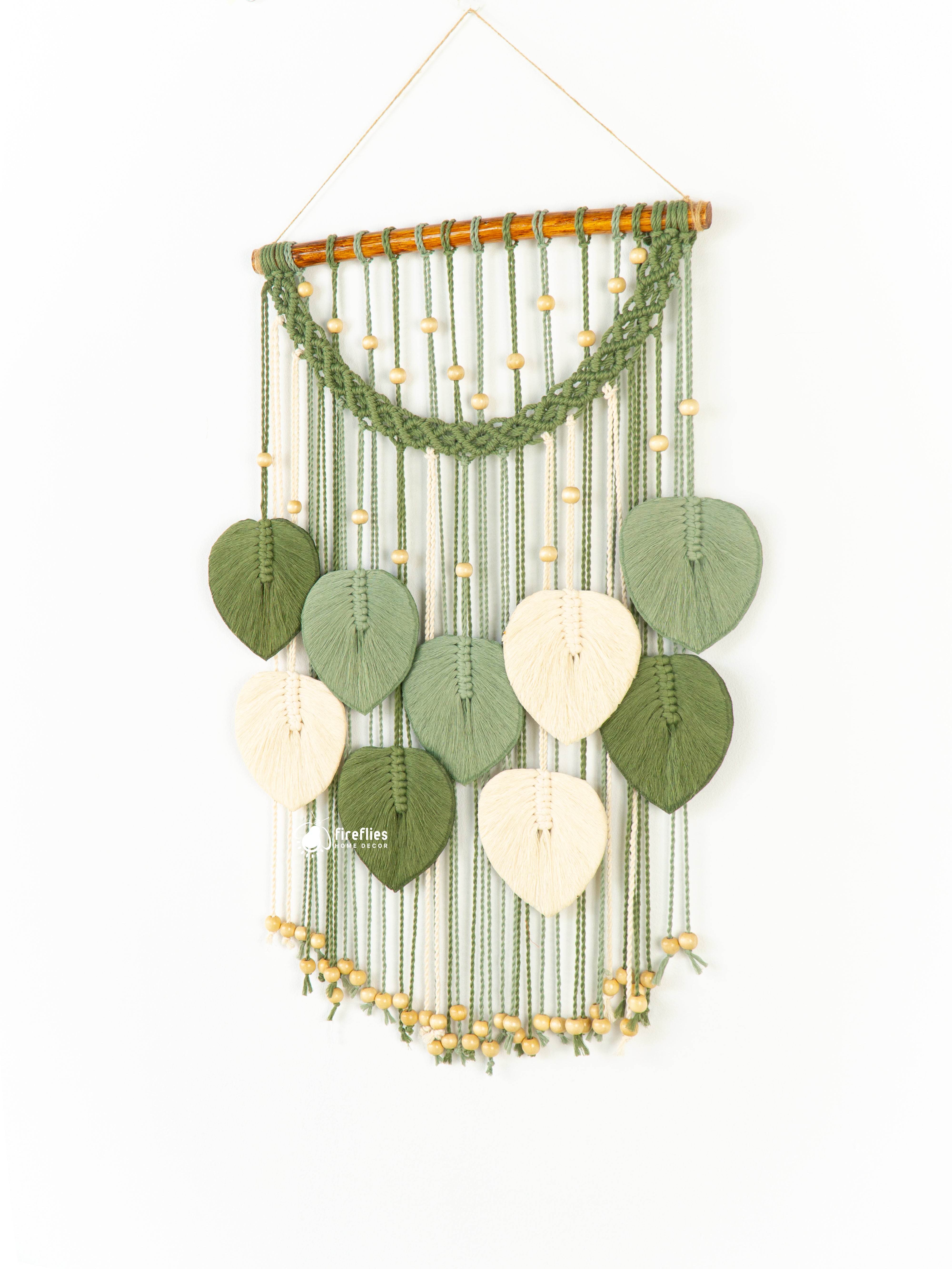 Handcrafted macrame leaf art, ideal for natural or simple spaces    
