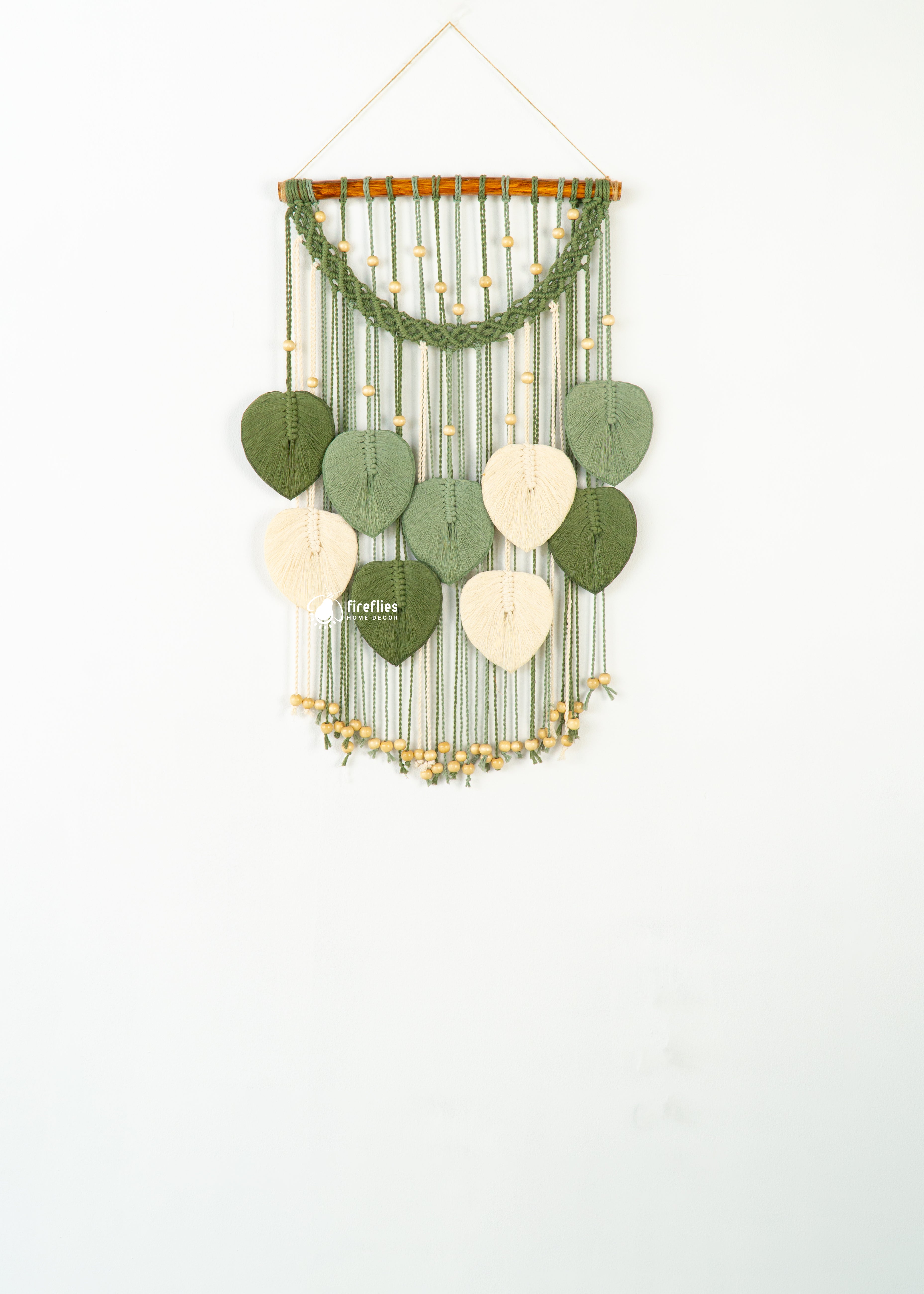 Boho macrame leaf wall hanging, great for cozy or earthy decor    
