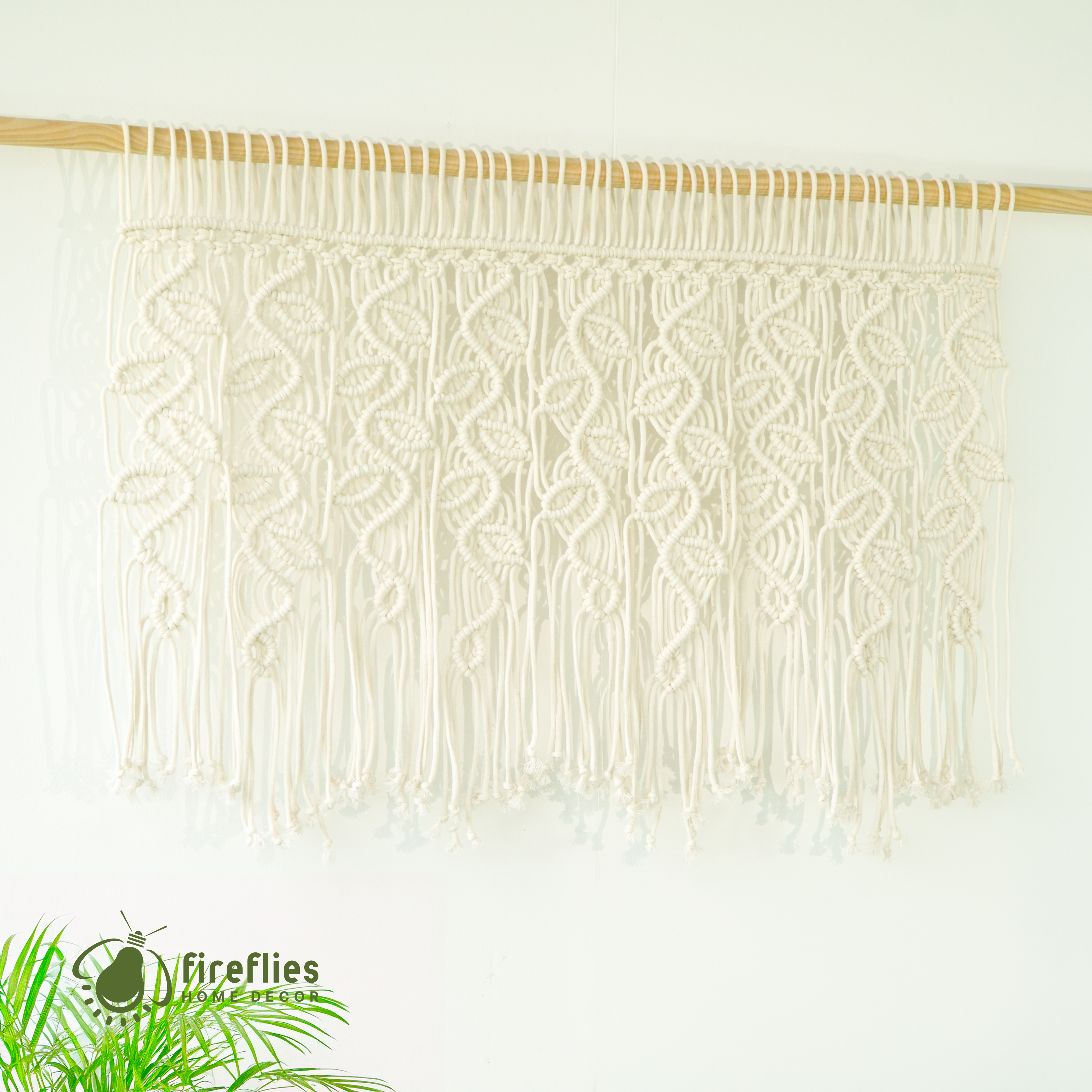 Macrame curtain decor, great for natural or boho-inspired homes 
