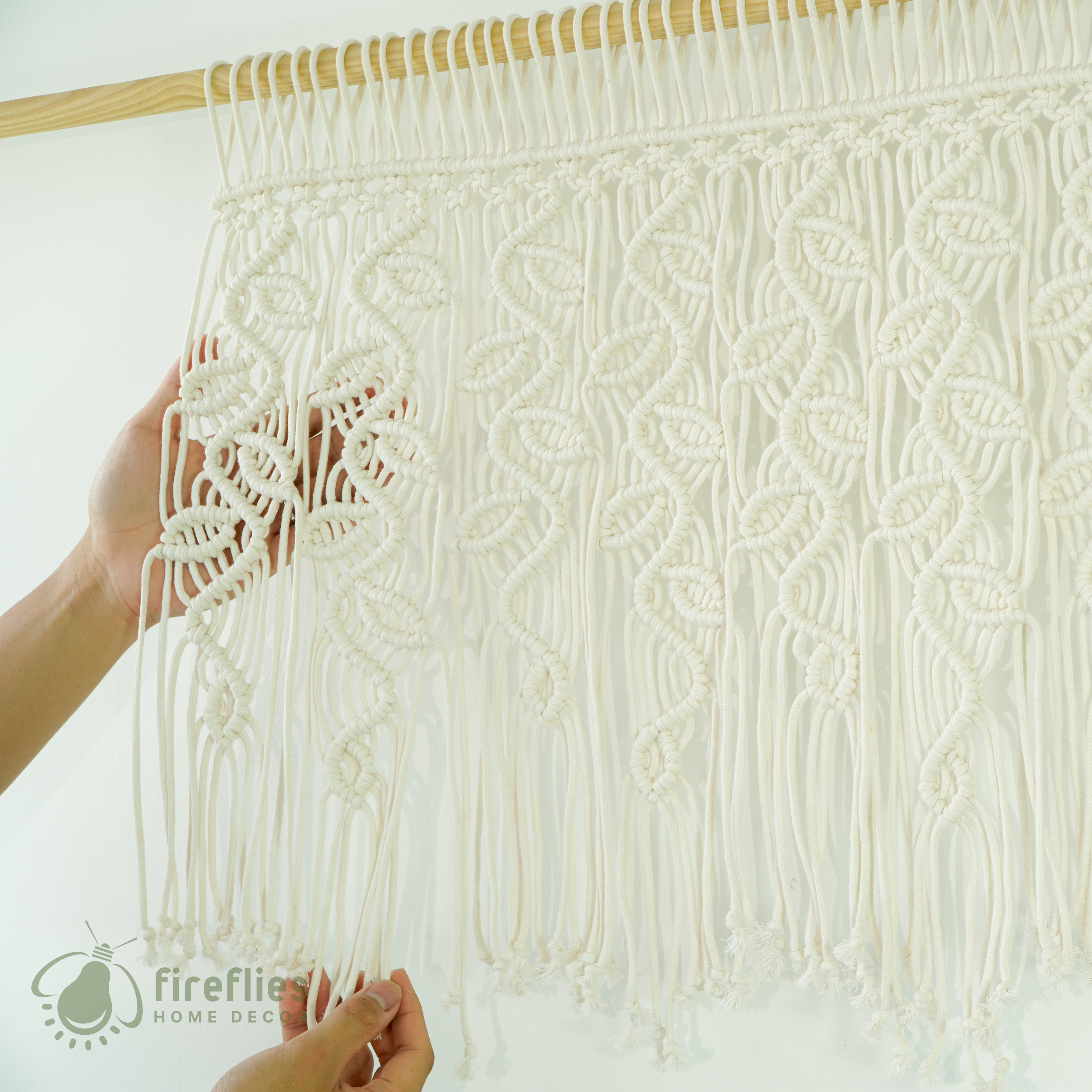 Handcrafted macrame curtain, ideal for modern or rustic spaces 
