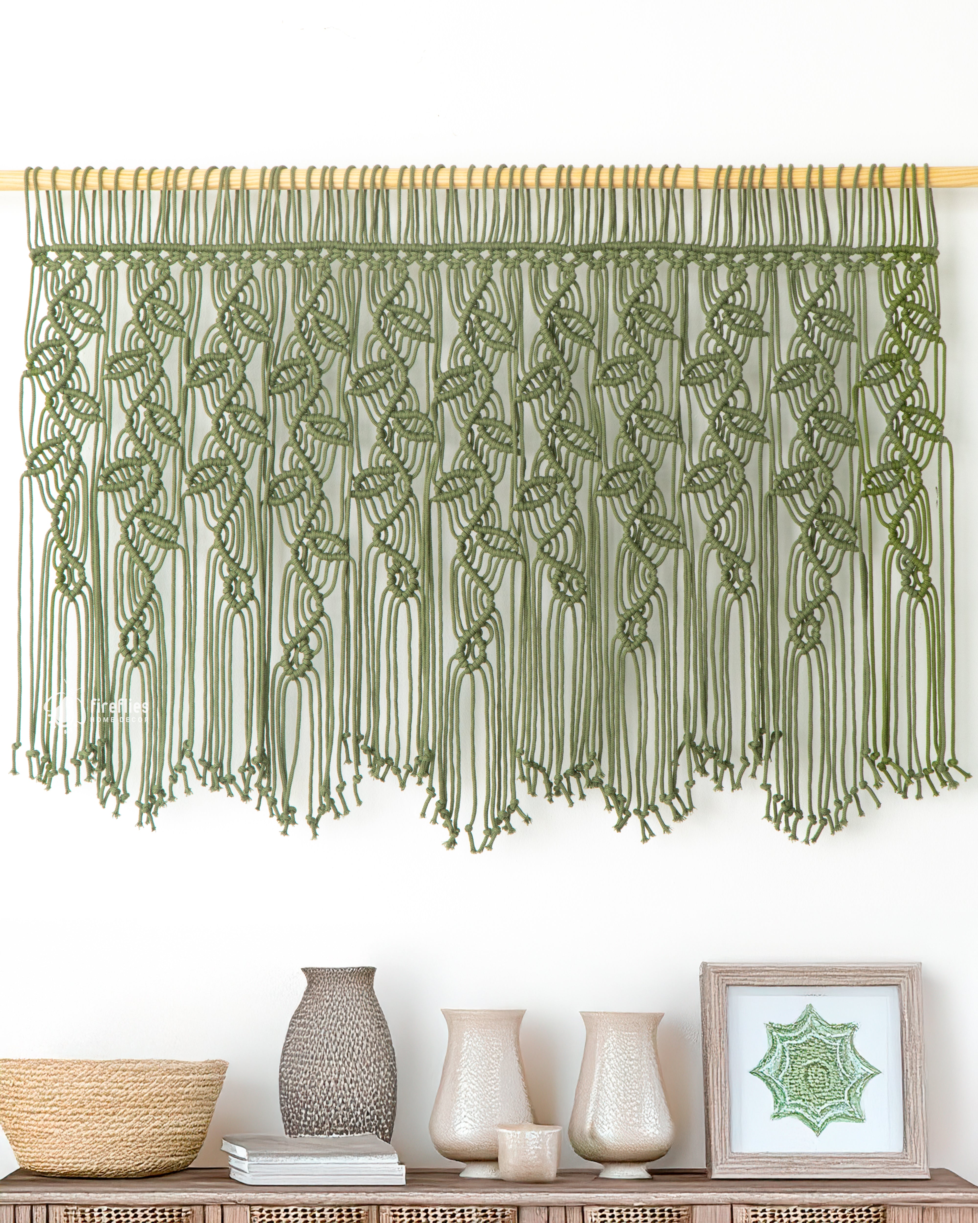 Macrame curtain hanging, ideal for modern or rustic decor 
