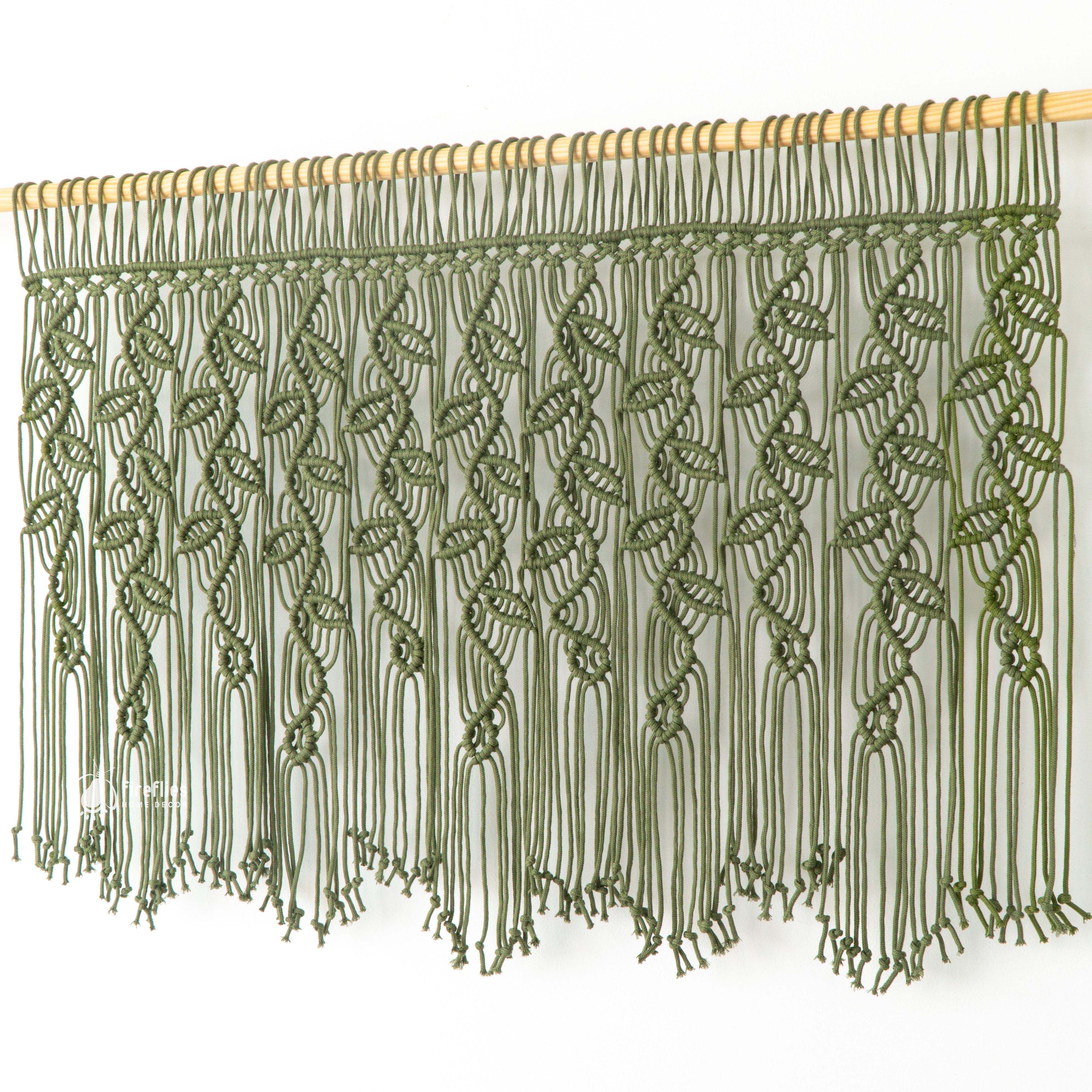 Natural macrame curtain, perfect for boho-inspired homes 

