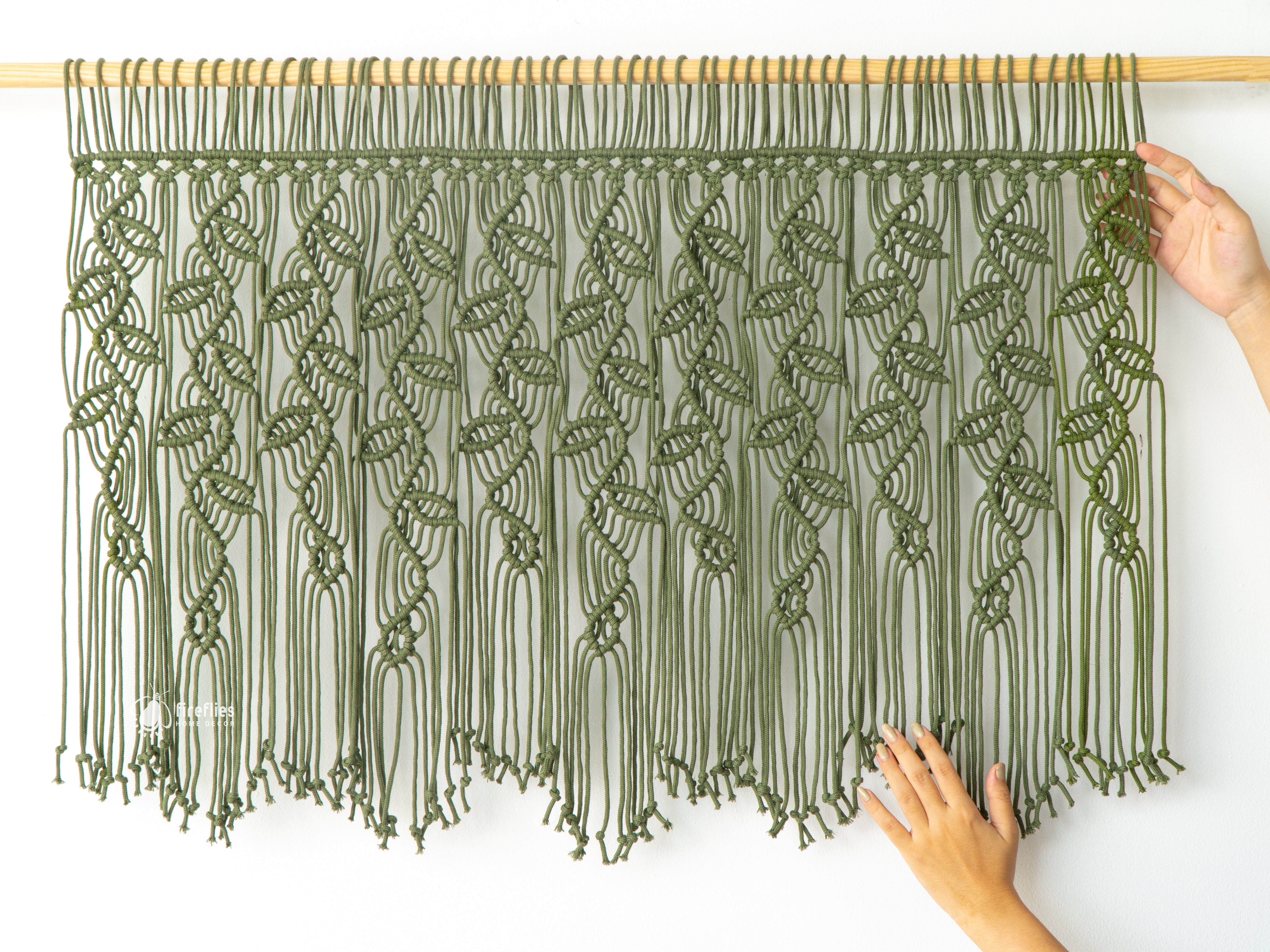 Handcrafted macrame curtain, perfect for minimalist or natural rooms 

