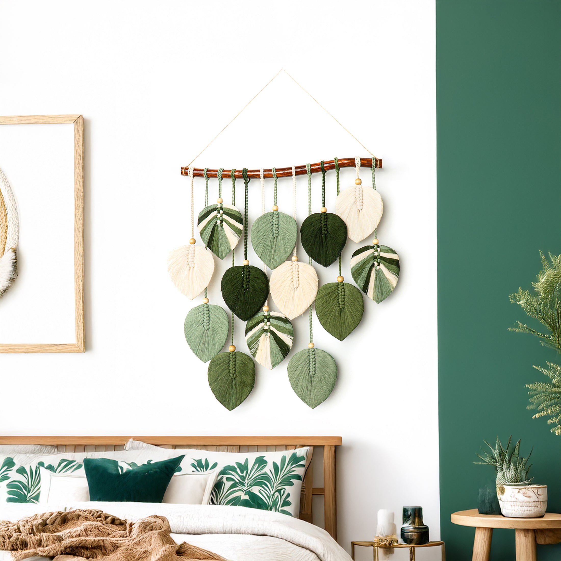 Decorative wall hanging with leaf patterns in a bedroom setting.