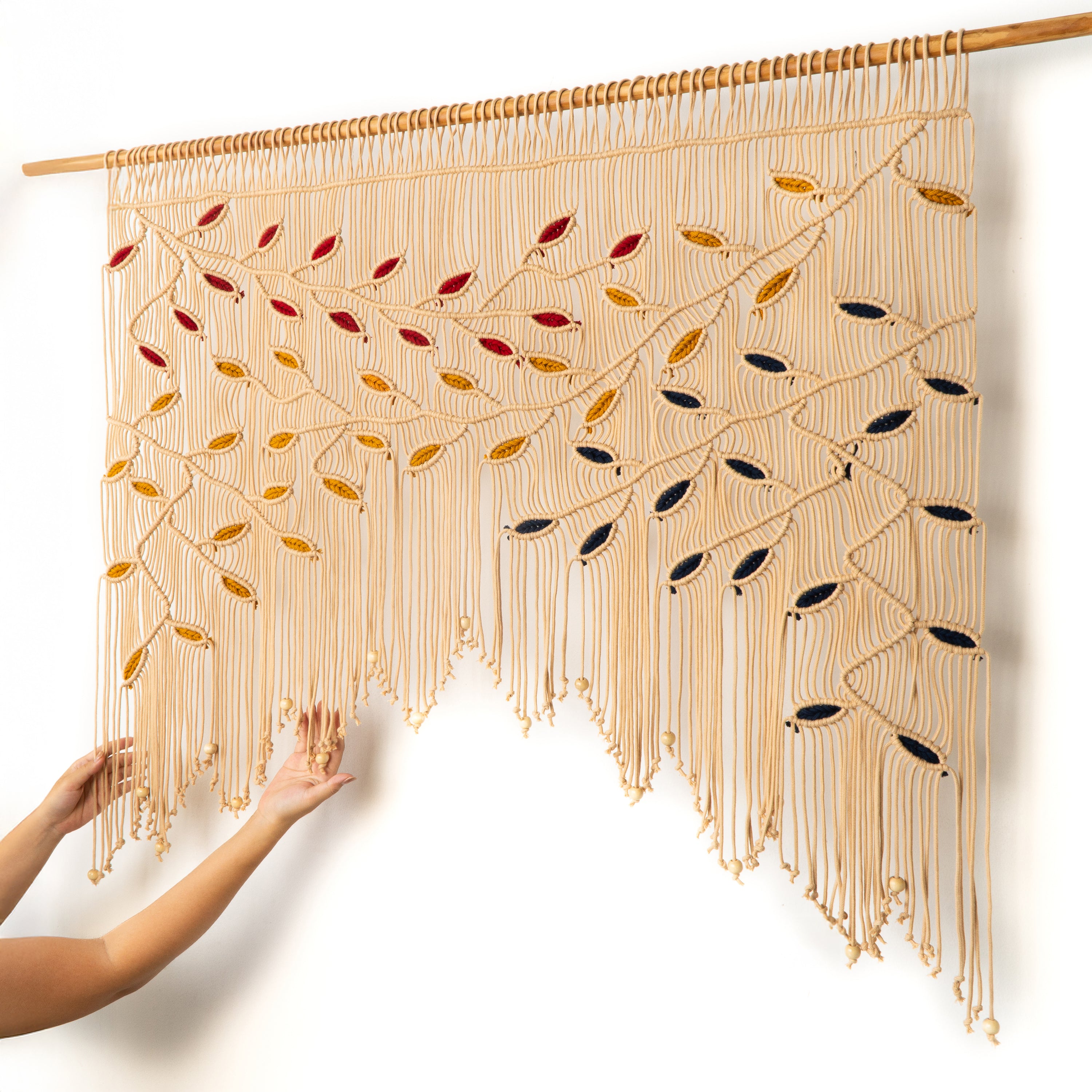 Decorative string art with leaf patterns on a white background