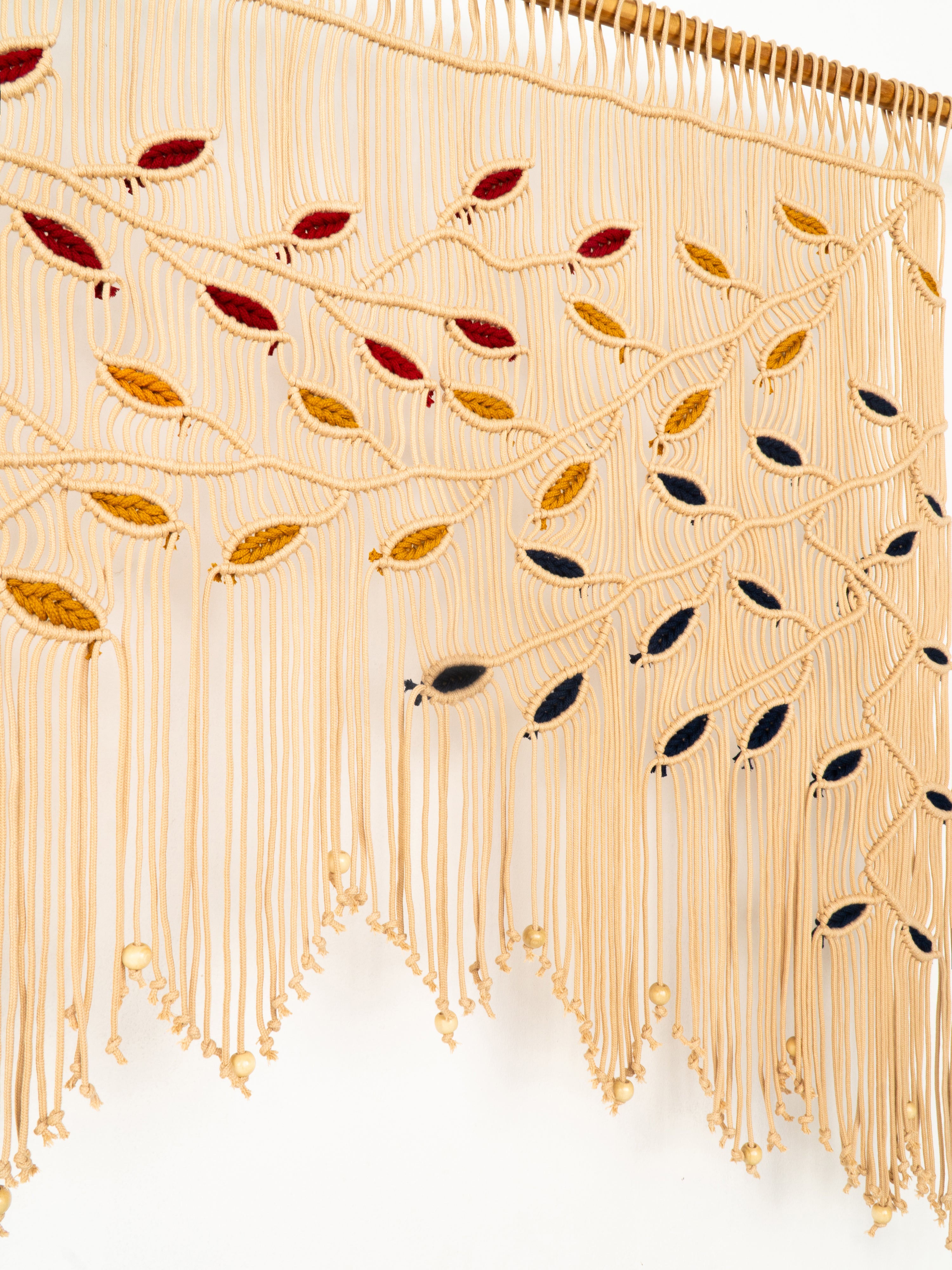 Decorative fabric with embroidered pattern on a white background