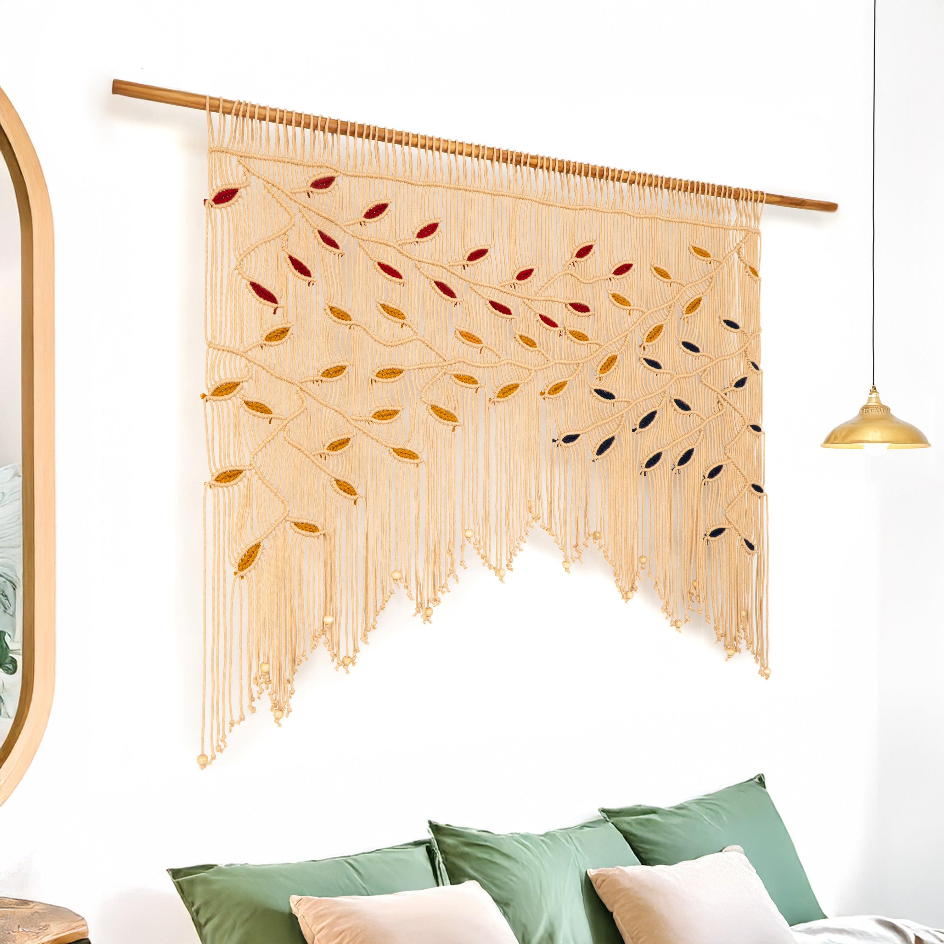 Decorative wall hanging with geometric pattern on a white wall.