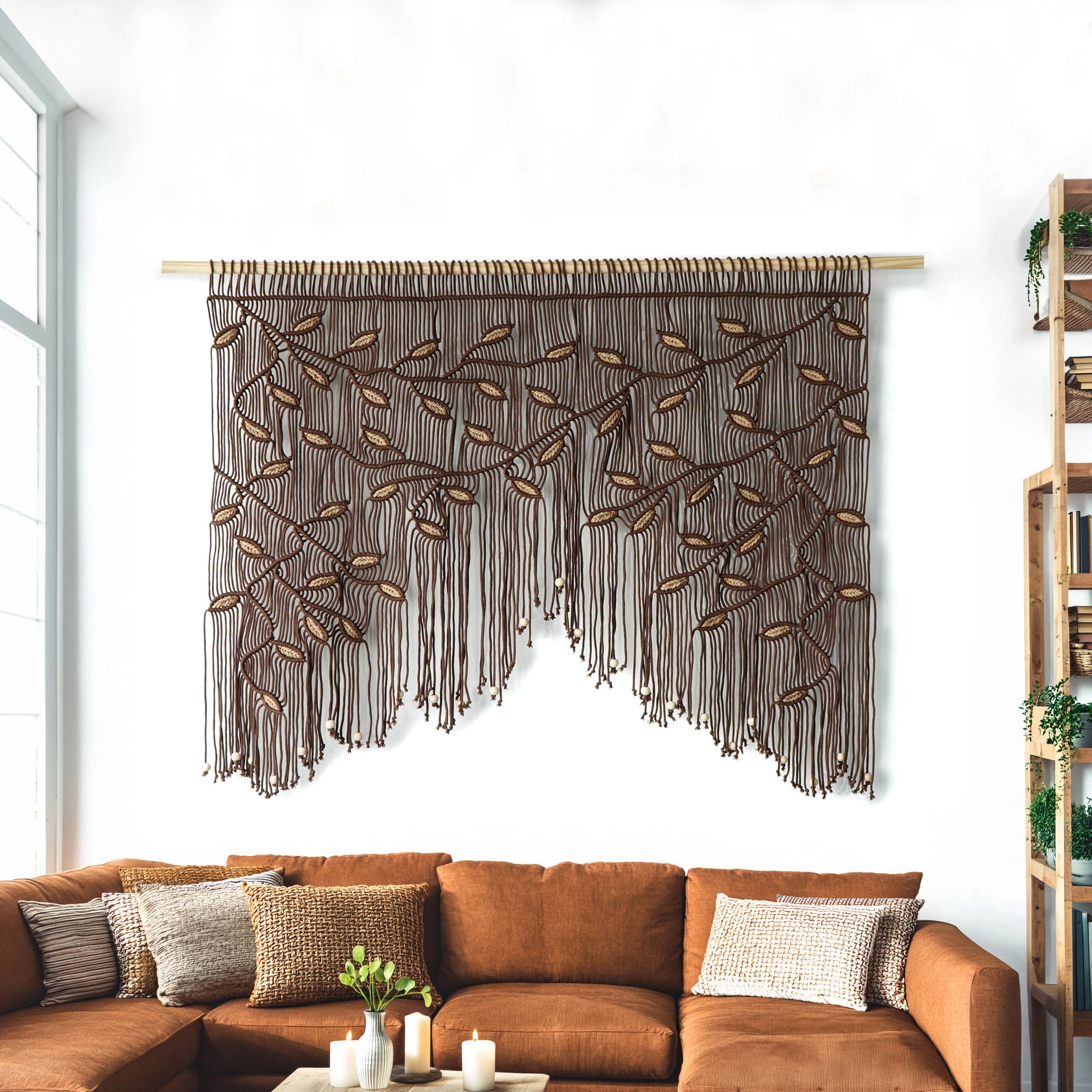 Large bohemian tapestry in chocolate and beige with a horizontal vine layout and decorative fringe.