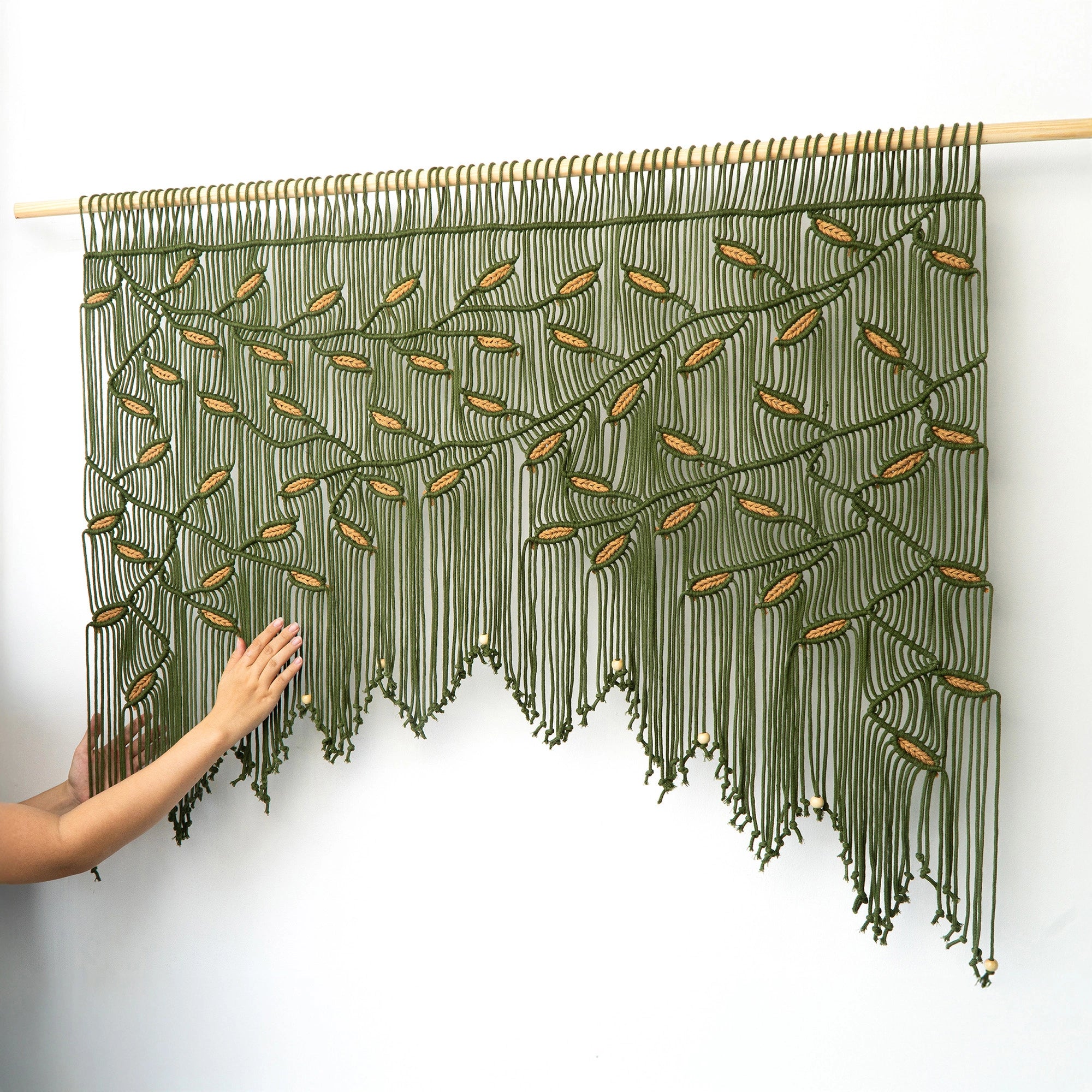 Wide olive green macrame wall mural with detailed terracotta leaf knotwork shipped fast from Houston.