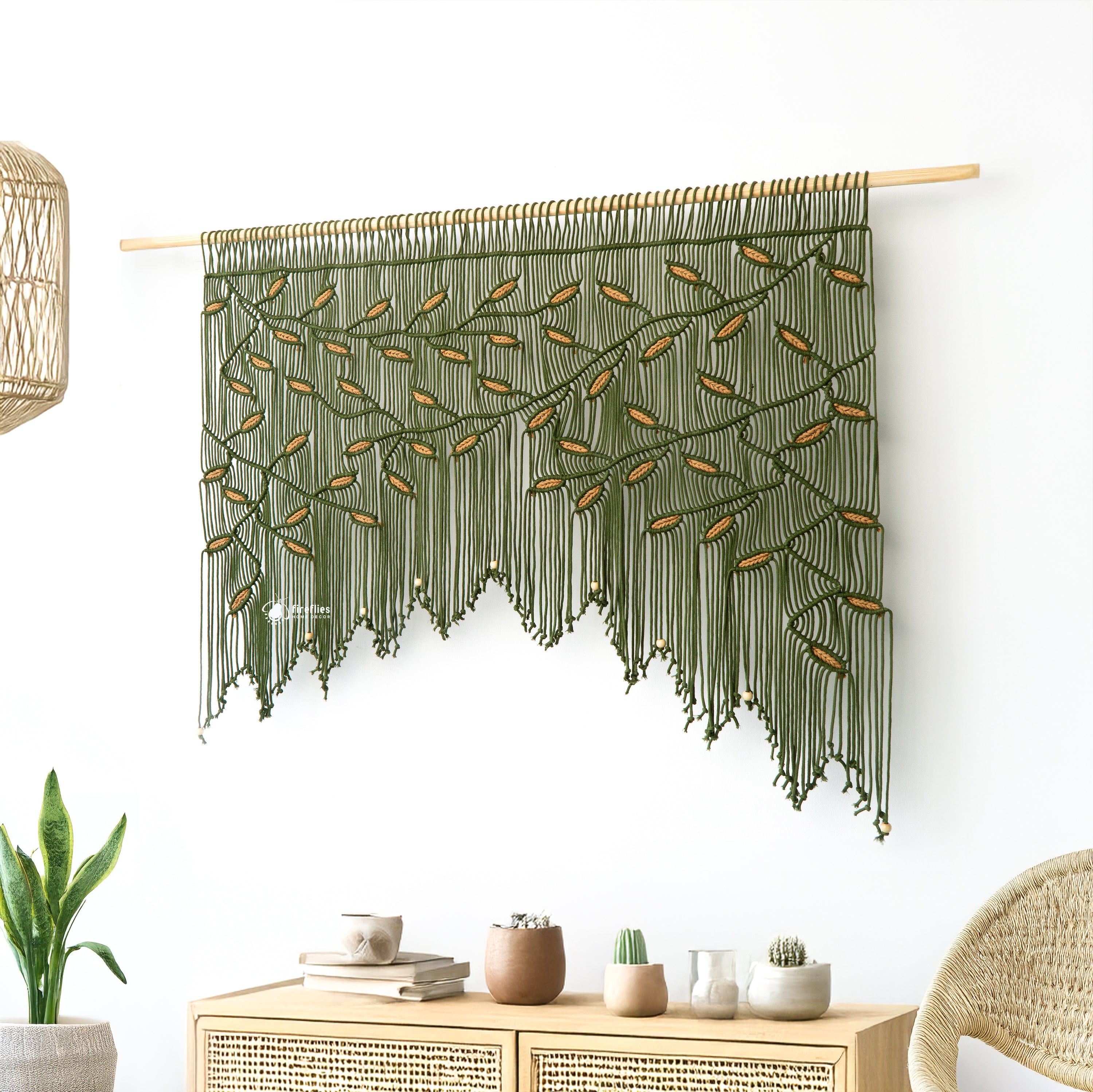 Macrame wall hanging on a white wall above a bed with wooden headboard