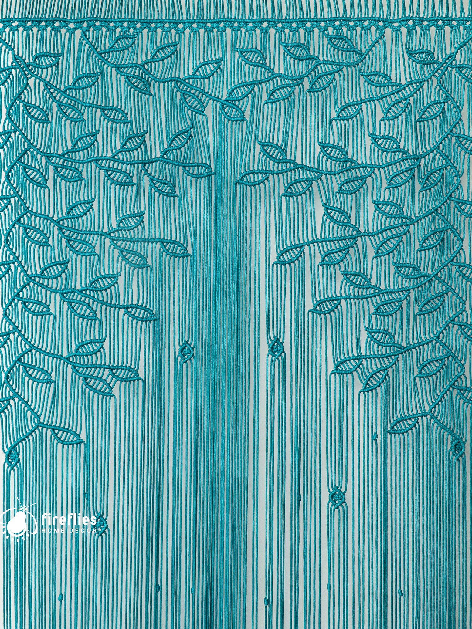 Teal curtain with leaf pattern