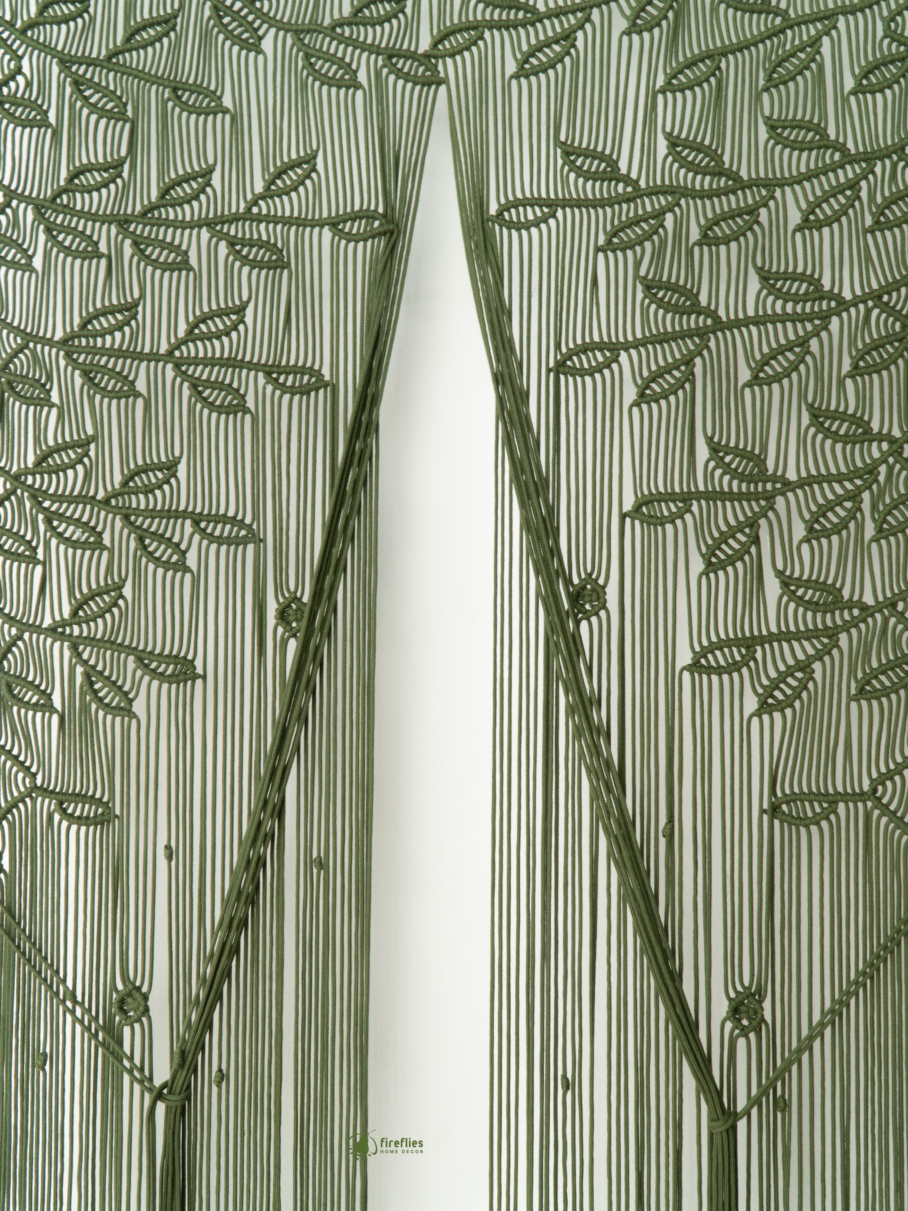 Decorative curtain with leaf pattern on a white background