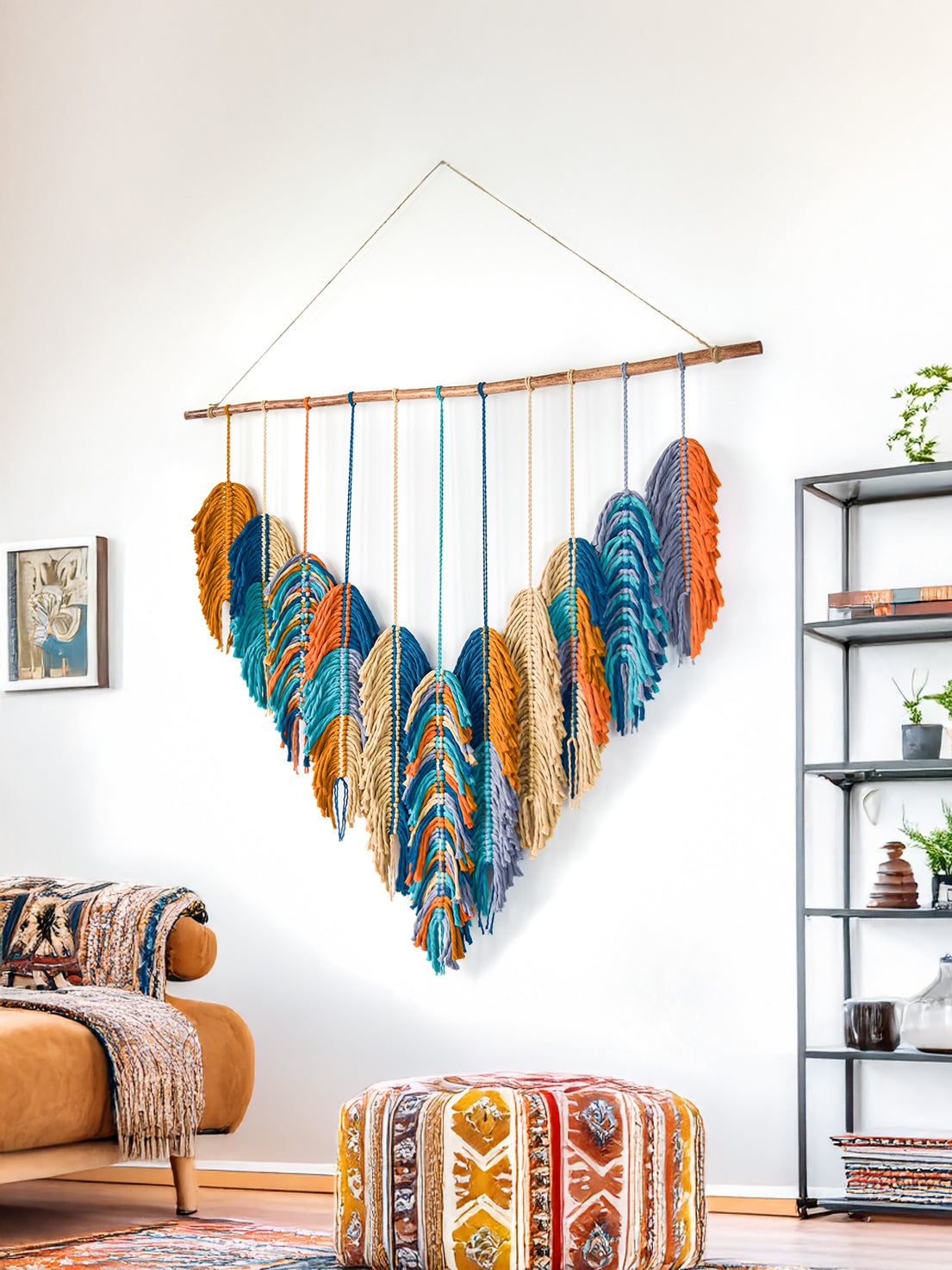 Colorful feather wall hanging in a living room setting