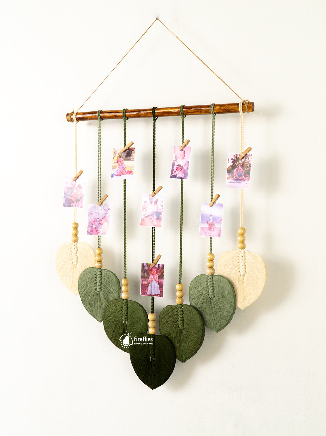 Handcrafted Macrame Leaf Wall Hanging Photo Display, ideal for modern or rustic spaces to hold treasured images.
