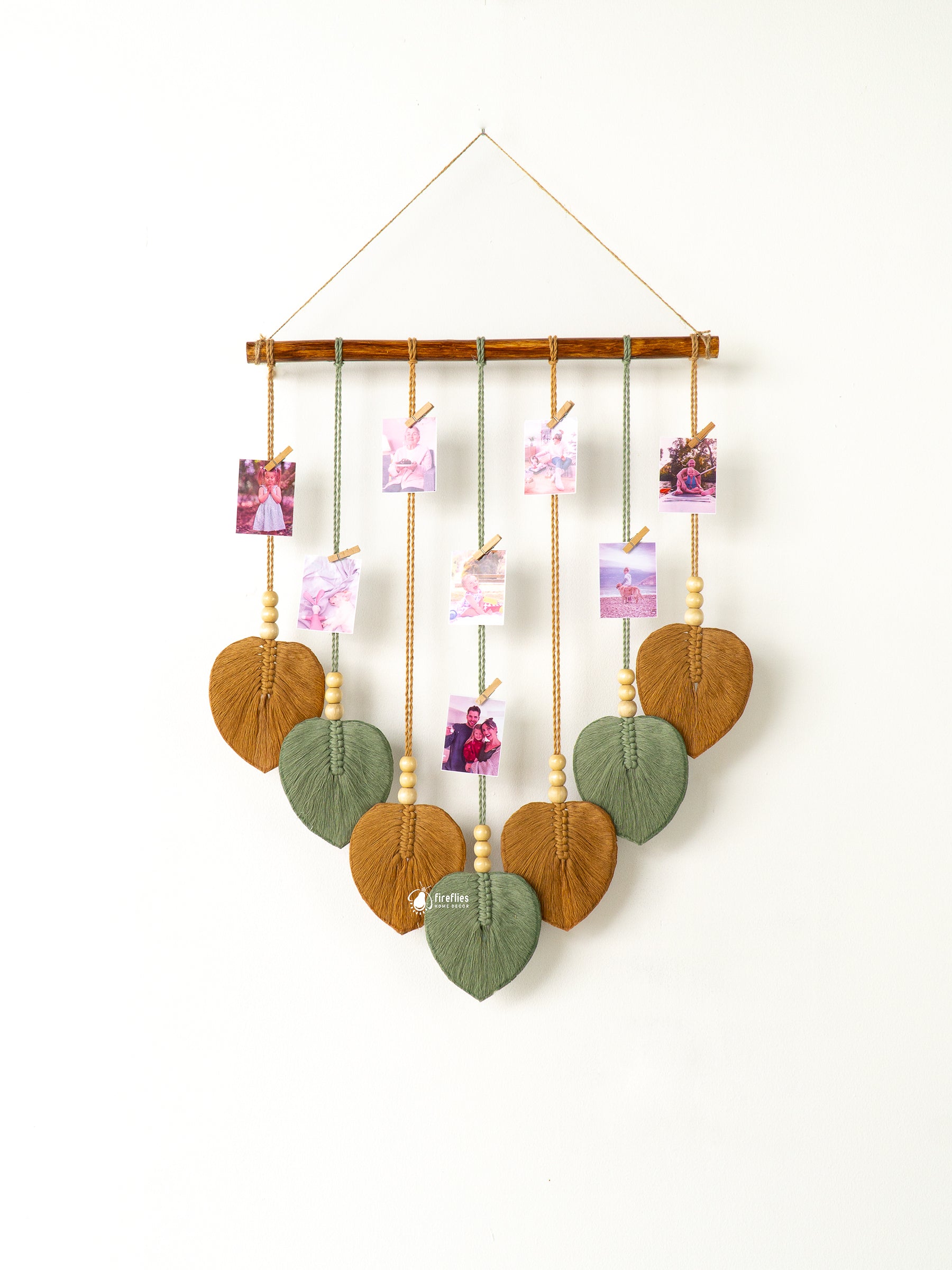 Macrame leaf photo display, great for natural or boho-inspired homes, offering a space to store special photos.

