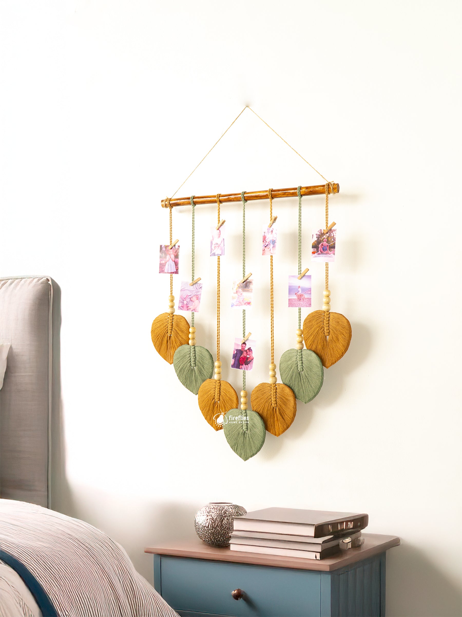 Handcrafted macrame leaf wall photo display, perfect for minimalist or natural rooms to keep cherished photos.
